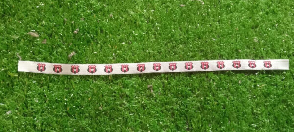 Cinta de tela LIGA DEPORTIVA ALAJUELENSE, color blanco con escudos LDA