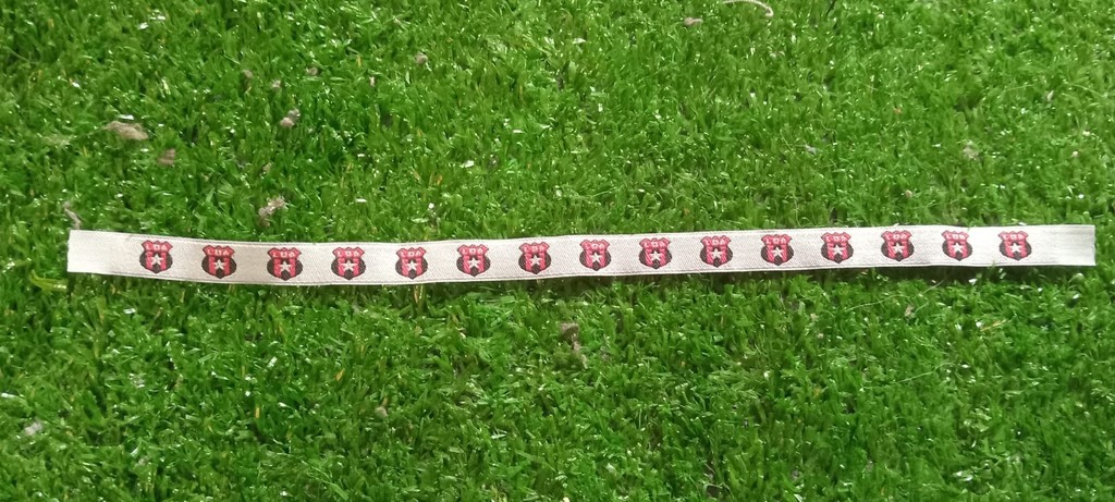 Cinta de tela LIGA DEPORTIVA ALAJUELENSE, color blanco con escudos LDA